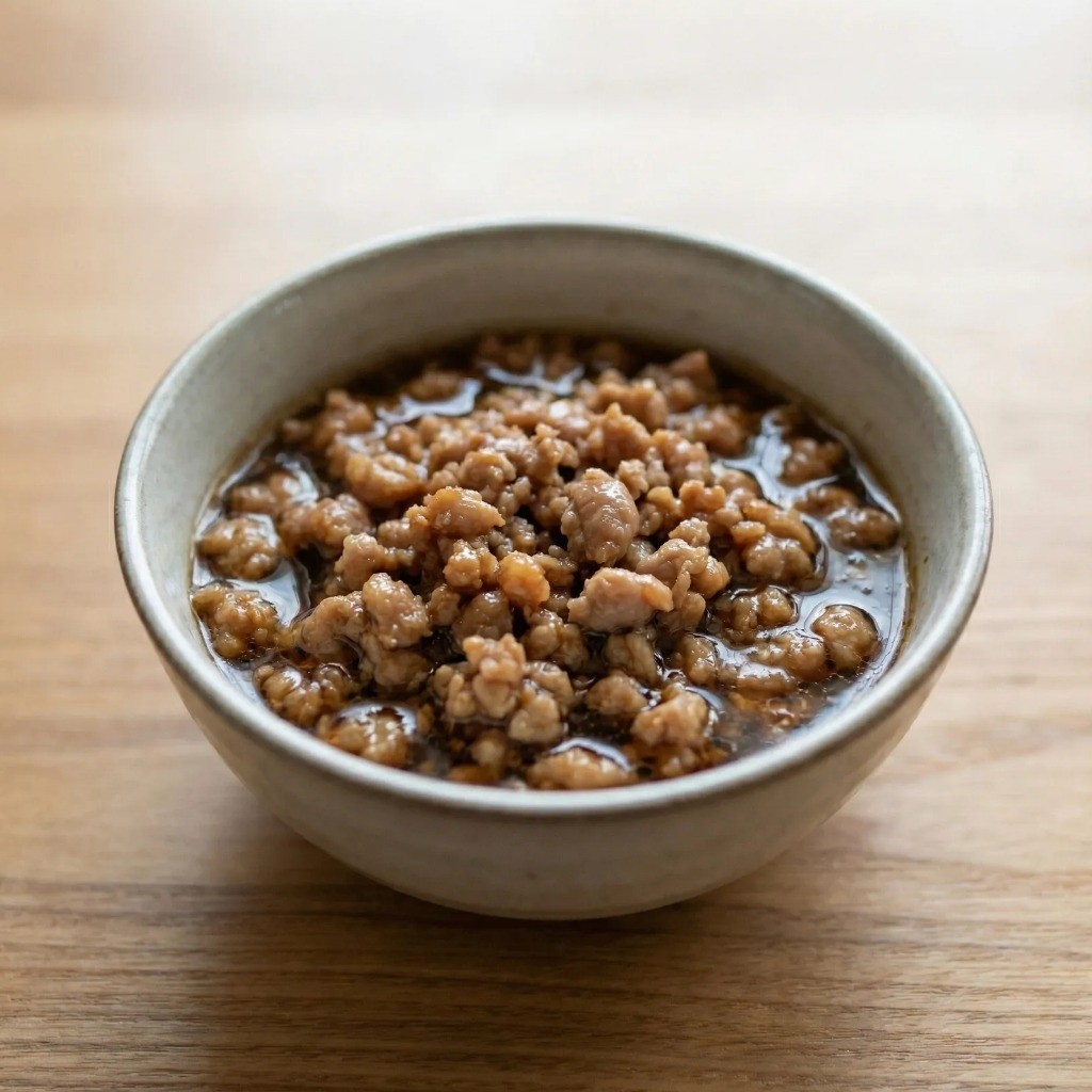 달래의 향을 살리기 위해 끓인 고기 간장을 식히는 과정