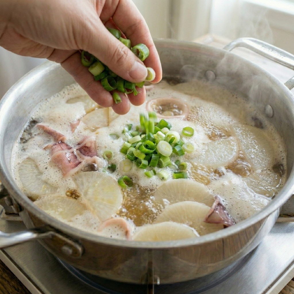 백종원 오징어무국 만들기 6단계: 마지막으로 대파를 듬뿍 넣어 완성한 얼큰한 해장용 맑은 오징어국