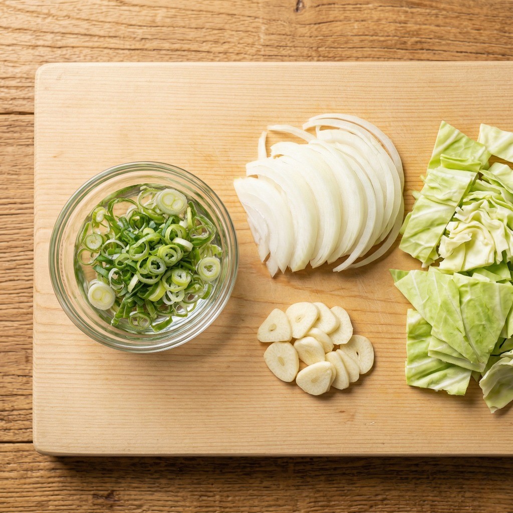 해물 카레 우동 재료 준비: 얇게 썬 파와 먹기 좋게 손질한 채소들