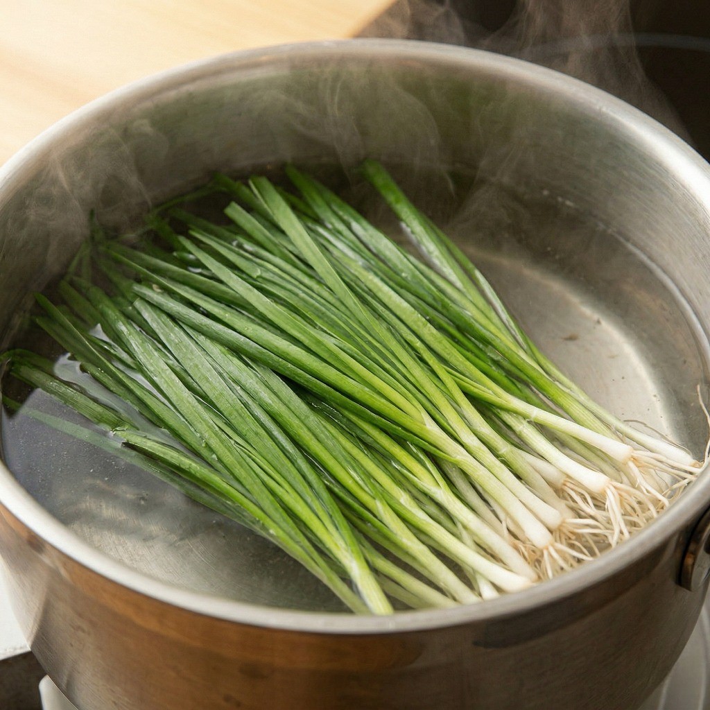 끓는 물에 파란 잎을 살짝 데쳐 면역력에 좋은 기장 쪽파 준비하기